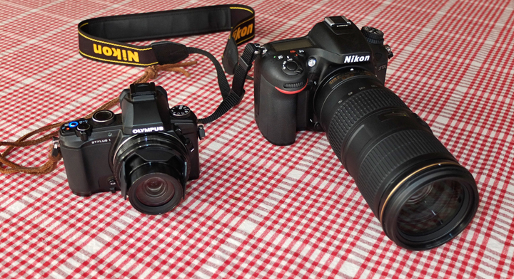 Olympus Stylus 1 beside a Nikon D7100 + 70-200mm zoom