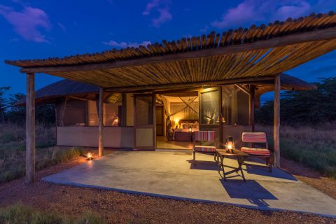 Camp Hwange guest chalet after dark, Hwange NP